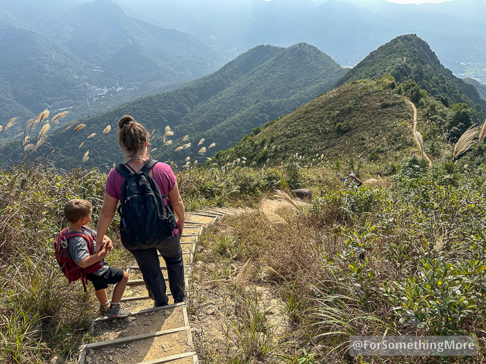 woman and son descending Ma Tsai Tung North Peak and Ma Tsai Tung South Peak